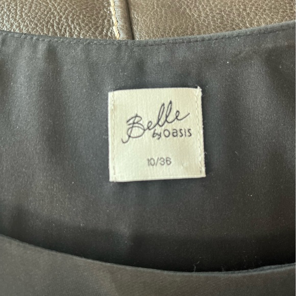 Beautiful fitted black satin LBD with flattering ruffle detail. US size 6. - Picture 2 of 4